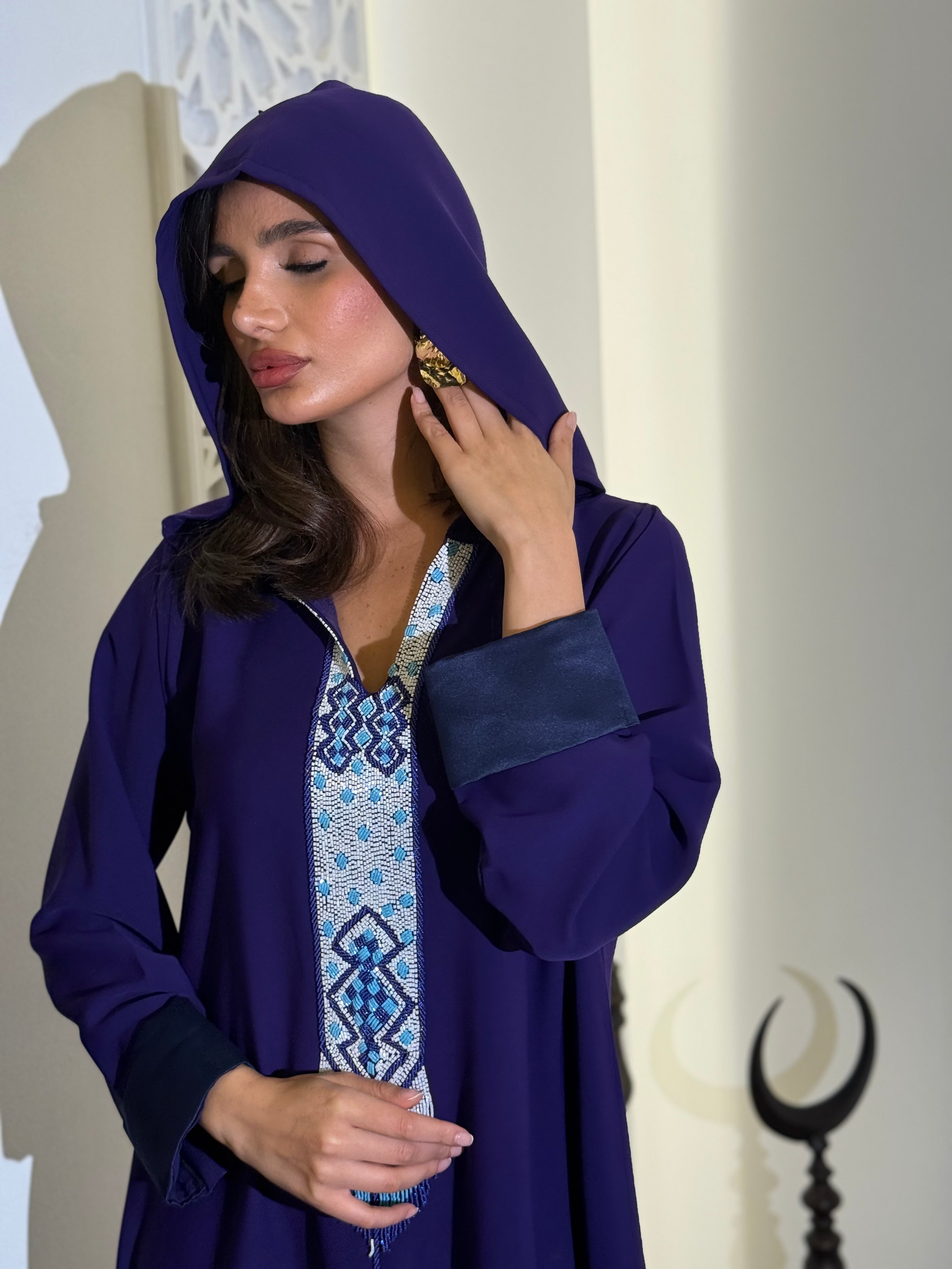Two-tone crepe jalabiya in deep purple with blue detailing, featuring delicate beadwork (on order)