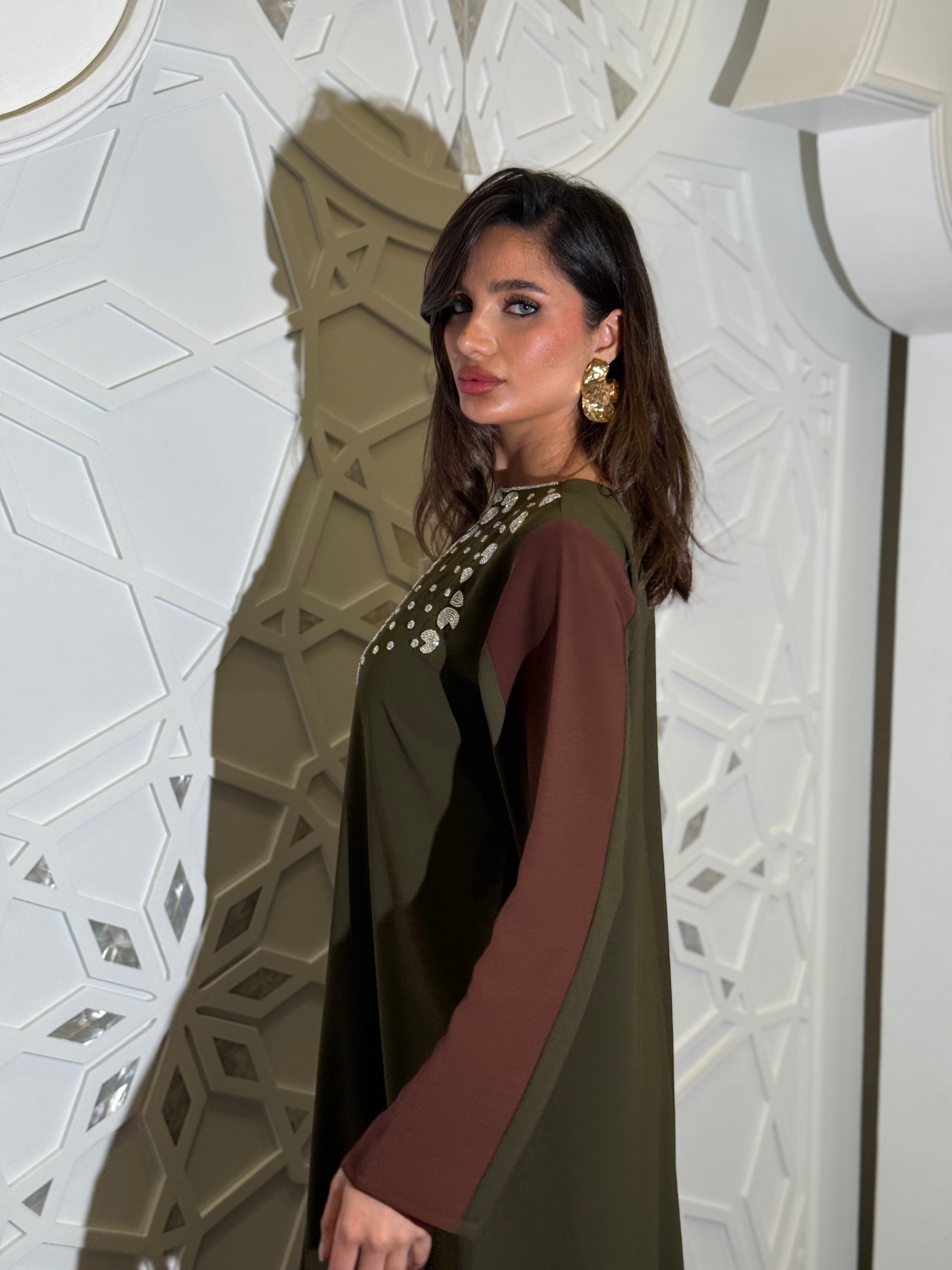 Two-tone crepe jalabiya in dark brown and olive, adorned with silver beadwork (on order )