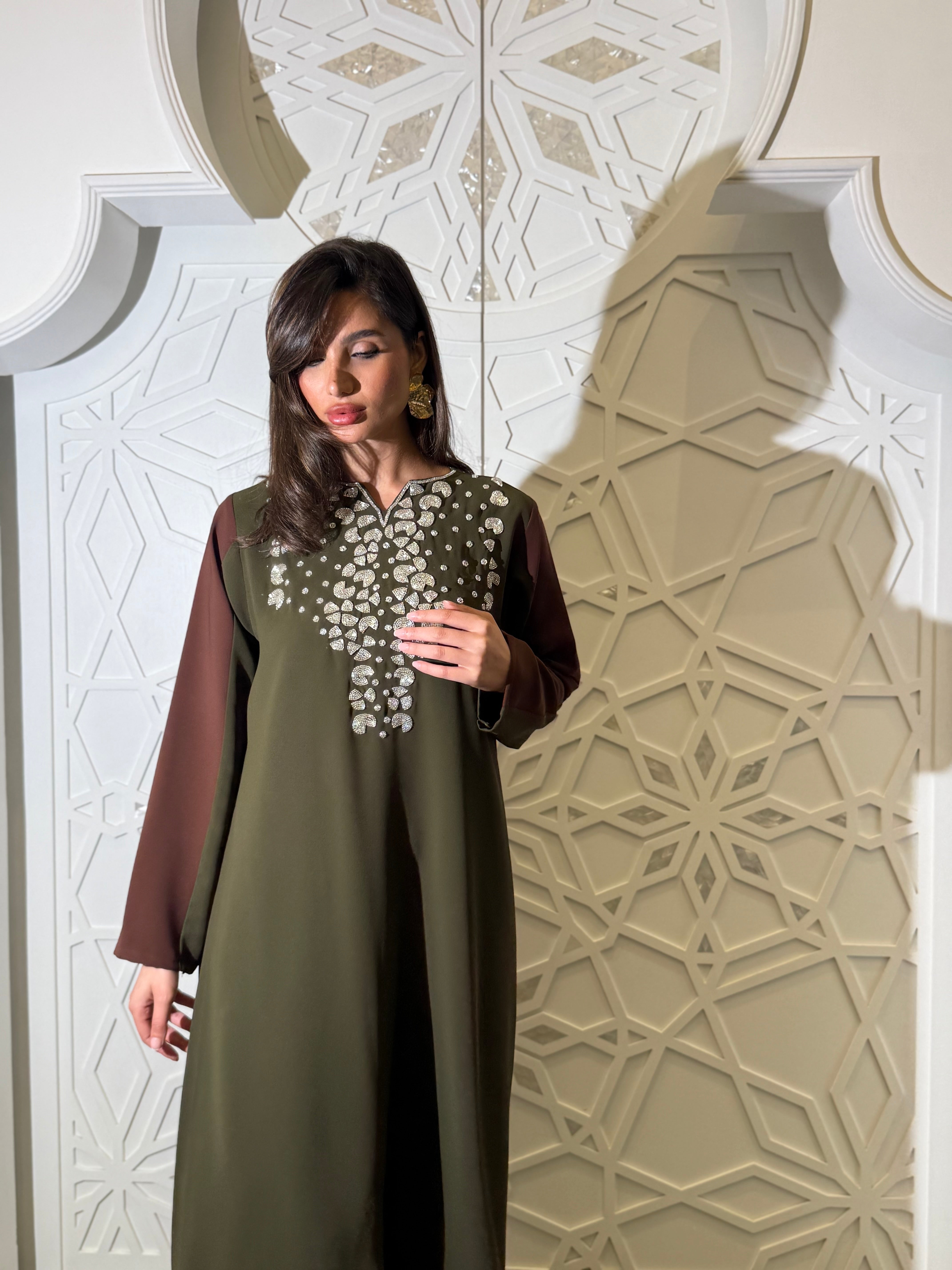 Two-tone crepe jalabiya in dark brown and olive, adorned with silver beadwork (on order )