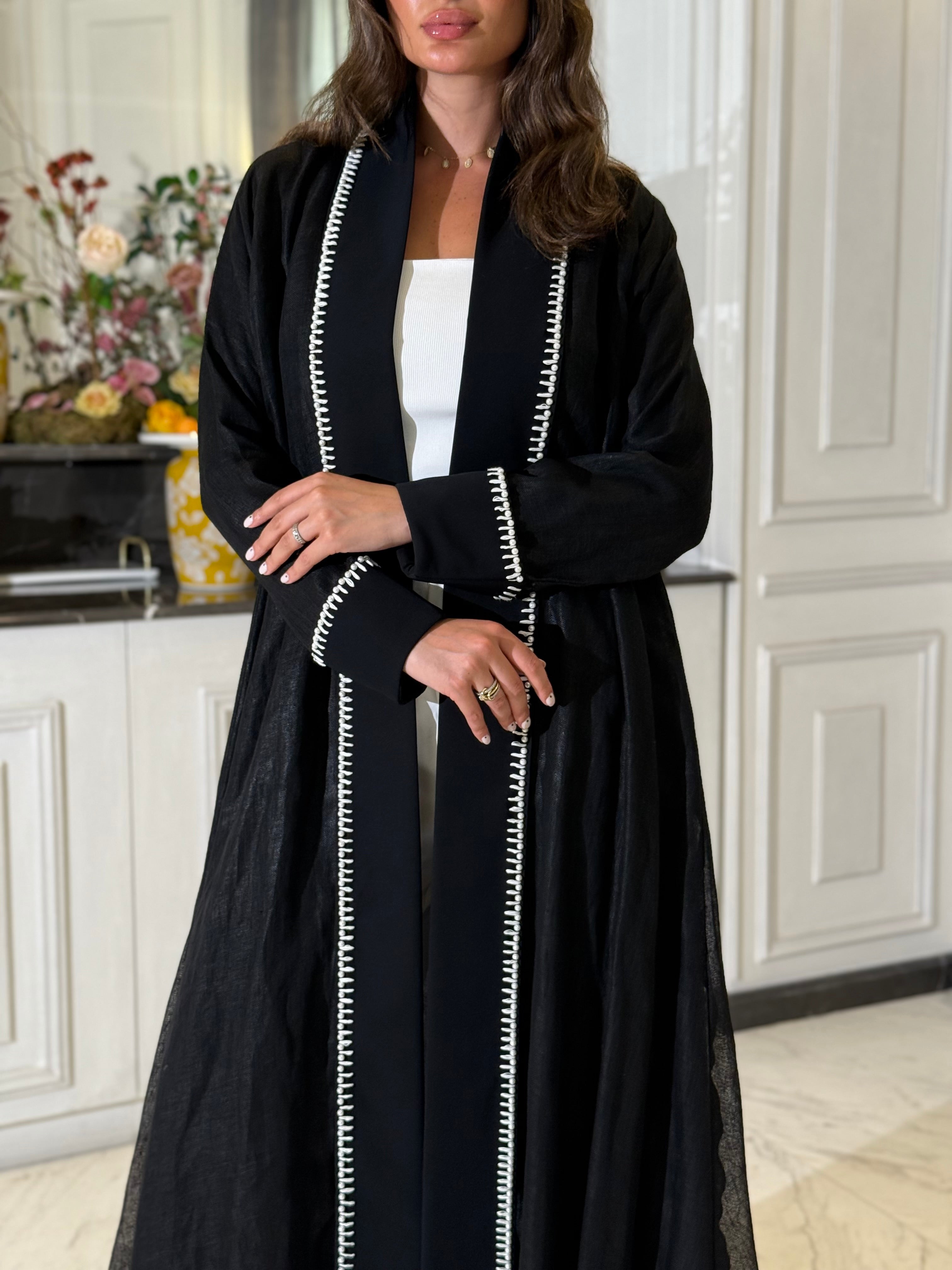 Two-piece linen set featuring a classic A-line silhouette
