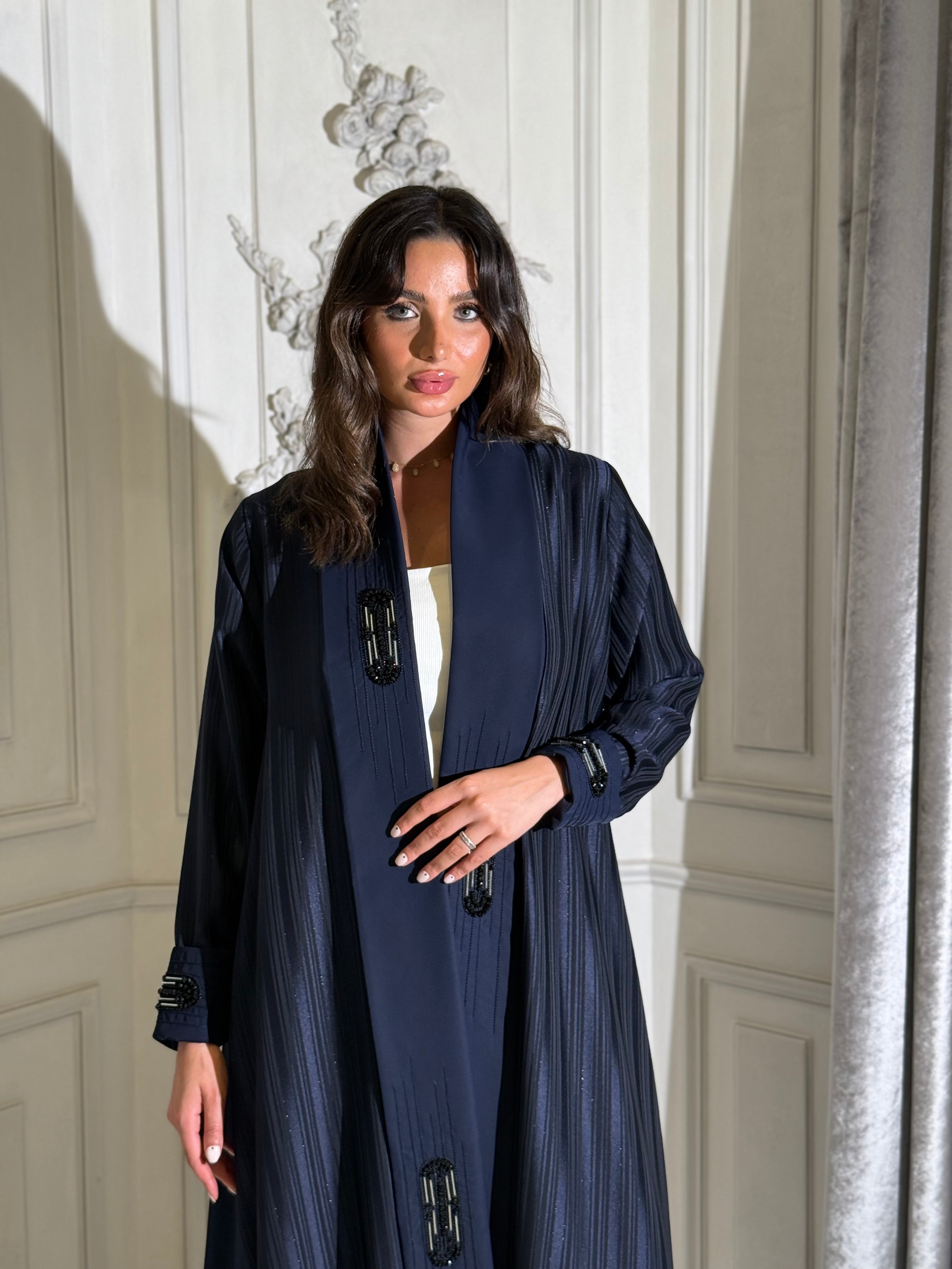 The Dantel Collection. Crafted from luxurious shimmering crepe with an elegant self-stripe weave