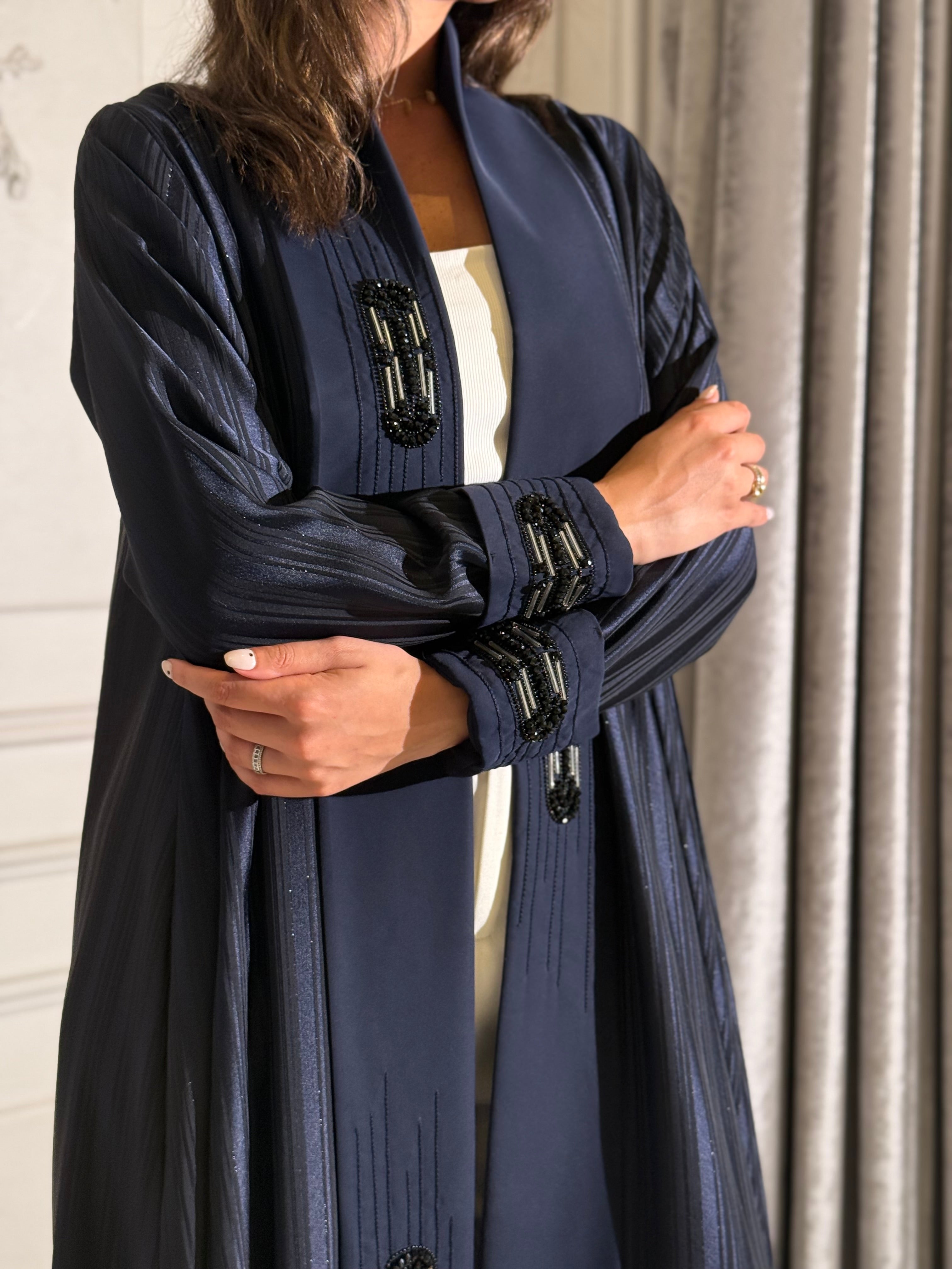 The Dantel Collection. Crafted from luxurious shimmering crepe with an elegant self-stripe weave