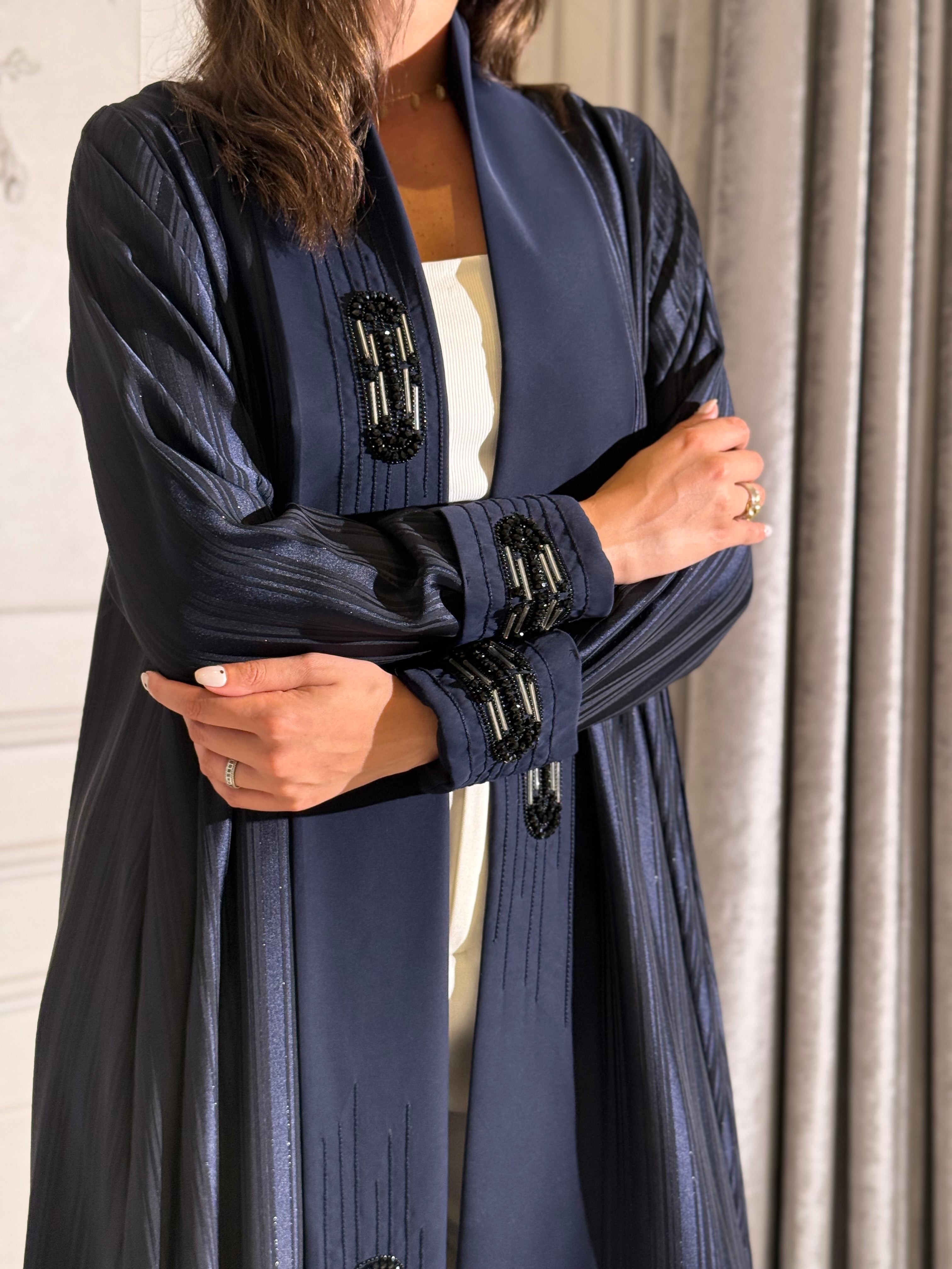 The Dantel Collection. Crafted from luxurious shimmering crepe with an elegant self-stripe weave