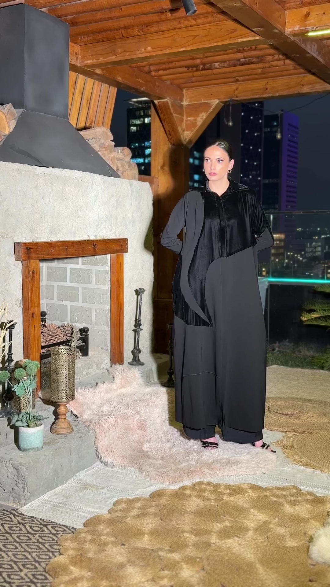 A tailored winter velvet blazer with structured crepe fabric and padded shoulders.